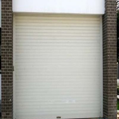 通州區(qū)安裝電動卷簾門北京東關(guān)安裝電動卷簾門更換電機(jī)